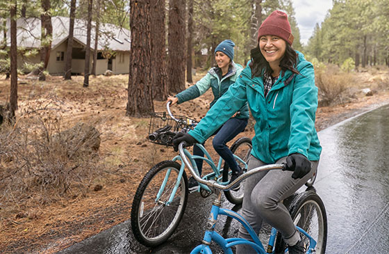 Young women riding bikes