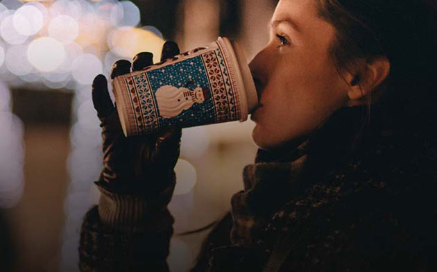 Woman drinks coffee.